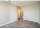 A bonus room featuring modern flooring, neutral walls, and an attic access point at 129 Eagleview Loop, Davenport, FL 33837