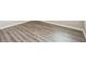 Close up of gray wood-look flooring at 129 Eagleview Loop, Davenport, FL 33837