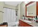Well-lit bathroom featuring a shower and a vanity with ample counter space at 1321 Arbor Vista Loop # 301, Lake Mary, FL 32746