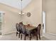 Dining room with a decorative table and chairs with modern lighting at 1321 Arbor Vista Loop # 301, Lake Mary, FL 32746