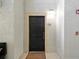 Apartment entrance with a black door and a 'Welcome' mat at 1321 Arbor Vista Loop # 301, Lake Mary, FL 32746