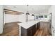 Spacious kitchen with a large island, stainless steel appliances, and open access to the living area at 1414 W New Hampshire St, Orlando, FL 32804