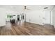 Bright and airy living room with wood floors, modern finishes, and open layout connecting to the kitchen at 1414 W New Hampshire St, Orlando, FL 32804