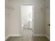 Walk-in closet leading into the bathroom at 144 Mandrake St, Orlando, FL 32811