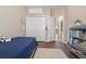 Bedroom features wood floors, closet, and décor at 15038 Masthead Landing Cir, Winter Garden, FL 34787