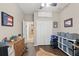 Office features wood floors, closet, and decor at 15038 Masthead Landing Cir, Winter Garden, FL 34787