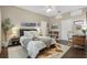 Comfortable main bedroom with hardwood floors, natural light, and neutral decor at 15038 Masthead Landing Cir, Winter Garden, FL 34787