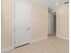 Empty bedroom with neutral walls, and tile floors at 16357 Se 88Th Ct, Summerfield, FL 34491