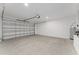 Spacious garage with garage door at 16357 Se 88Th Ct, Summerfield, FL 34491