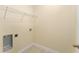 Empty laundry room with tile floors and washer/dryer hookups at 16357 Se 88Th Ct, Summerfield, FL 34491
