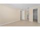 Spacious primary bedroom with walk-in closet and bright bathroom access ensuring a luxurious experience at 16357 Se 88Th Ct, Summerfield, FL 34491