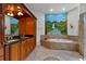Elegant bathroom features a soaking tub and large vanity at 19232 Somerset St, Orlando, FL 32833