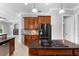 Well-equipped kitchen features stainless steel appliances and granite countertops at 19232 Somerset St, Orlando, FL 32833