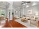 Bright living room showcasing hardwood floors, neutral colors, and modern furniture arrangement at 19232 Somerset St, Orlando, FL 32833