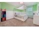 Bedroom with canopy bed, modern color paint and carpet floor at 1961 Continental St, St Cloud, FL 34769
