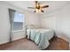 Cozy bedroom with natural light from the window and carpet floors at 1961 Continental St, St Cloud, FL 34769