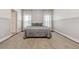 Serene bedroom features stylish decor, soft carpet, and natural light, creating a cozy and inviting atmosphere at 1961 Continental St, St Cloud, FL 34769