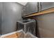 Well-equipped laundry room with modern appliances, ample storage, and sleek design, making chores a breeze at 1961 Continental St, St Cloud, FL 34769