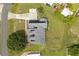 Birds eye view of a house with solar panels on the roof, showcasing a modern design at 2050 Jan Lan Blvd, St Cloud, FL 34772