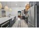 Stylish kitchen with island, stainless steel appliances, and custom cabinetry at 2050 Jan Lan Blvd, St Cloud, FL 34772