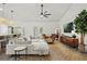 Airy open-concept living room blending modern design with a comfortable and inviting atmosphere at 2050 Jan Lan Blvd, St Cloud, FL 34772