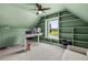 Bright office space with built-in shelving, a desk, and a window overlooking the yard at 2050 Jan Lan Blvd, St Cloud, FL 34772