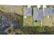 Aerial view of a home with a compact backyard and partial privacy fence at 2222 Derwent Dr, Davenport, FL 33896