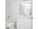 Bathroom featuring a vanity with a mirror and a tub-shower combo at 2222 Derwent Dr, Davenport, FL 33896