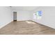 Bright living room featuring an open floor plan, tile flooring, and natural light at 2222 Derwent Dr, Davenport, FL 33896