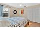 Comfortable bedroom with a ceiling fan, closet and a sliding glass door for natural light at 2342 Audley St, Oviedo, FL 32765