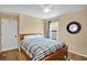 This bedroom has a ceiling fan, a large window and closet with natural light at 2342 Audley St, Oviedo, FL 32765