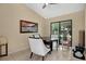Dining room features a modern ceiling fan and sliding glass doors that provide natural light at 2342 Audley St, Oviedo, FL 32765