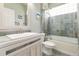 Bathroom featuring a combination shower and tub with tiled surround and a vanity at 23647 Seneca Ridge Ct, Christmas, FL 32709