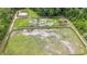 Horse arena featuring wooden fences and a view of horses at 23647 Seneca Ridge Ct, Christmas, FL 32709