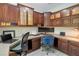 Office space with custom wood built-ins and two separate work stations at 23647 Seneca Ridge Ct, Christmas, FL 32709