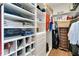 Organized walk-in closet with shelving and drawers to maximize storage space at 23647 Seneca Ridge Ct, Christmas, FL 32709