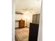 Small bedroom with a ceiling fan, dresser, and a stylish rug at 312 W Hull Ave, Oakland, FL 34760