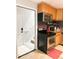 Well-equipped kitchen with stainless steel appliances, granite countertops, and a functional layout at 312 W Hull Ave, Oakland, FL 34760