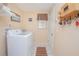 Well-equipped laundry room with modern washer and dryer at 3231 Furlong Way, Gotha, FL 34734