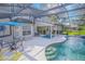 Relaxing screened-in pool area with a patio, lounge seating, and clear blue water, great for entertaining at 3231 Furlong Way, Gotha, FL 34734