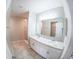 Bathroom with double sink vanity, lots of counter space, and tiled floor at 3381 Sw 129Th Loop, Ocala, FL 34473