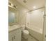 Clean bathroom featuring a vanity with a sink, toilet, and shower-tub combination at 3381 Sw 129Th Loop, Ocala, FL 34473