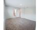 Spacious bedroom features neutral walls and soft carpet flooring at 3381 Sw 129Th Loop, Ocala, FL 34473