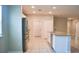 Modern kitchen features stainless steel appliances, granite countertops, and tile flooring at 3381 Sw 129Th Loop, Ocala, FL 34473