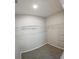Walk-in closet with wire shelving for organizing clothing and accessories at 3381 Sw 129Th Loop, Ocala, FL 34473