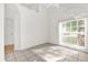 Cozy bedroom featuring a large window and ample natural light at 3390 Cypress Point Cir, St Cloud, FL 34772