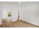 A spacious bedroom featuring a closet, tile flooring, and neutral paint at 3390 Cypress Point Cir, St Cloud, FL 34772