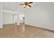 Open living room with tile flooring and a view of the kitchen at 3390 Cypress Point Cir, St Cloud, FL 34772