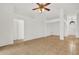 Spacious living room with neutral walls and tile floors at 3390 Cypress Point Cir, St Cloud, FL 34772