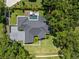 Aerial view of a home highlighting the meticulously landscaped yard, pool, and entertainment area at 340 Lakeview Rd, Winter Garden, FL 34787